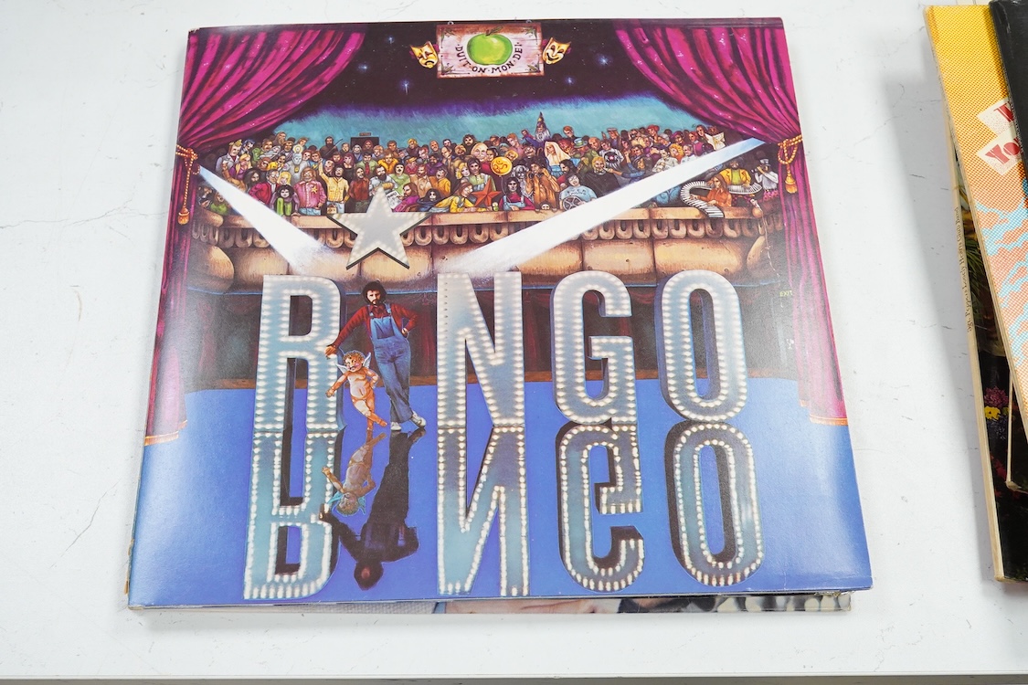Fourteen LP record albums including eleven The Beatles and related; Sgt. Pepper’s Lonely Hearts Club Band (plus an additional three others), The Beatles at the Hollywood Bowl, Magical Mystery Tour, Revolver, etc., plus t